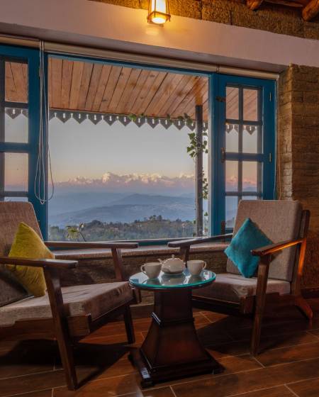 Comfortable hotel room interior with sofa and chair